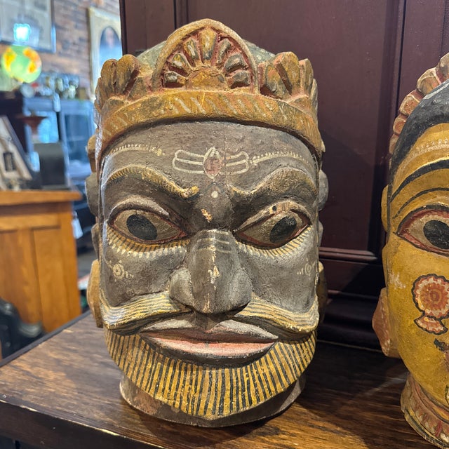 Antique pair of handcarved and painted wooden heads. Indian folk art- possibly dirtied or mythological characters in...