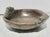 Heavy dark bronze bowl by Otto Meyers. Thick weighty bronze with two lions chasing each other and catching the tail of the...