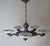 This elegant Art Deco chandelier, with its five beautiful alabaster bowls, is sure to be a real eye-catcher. The lamp...