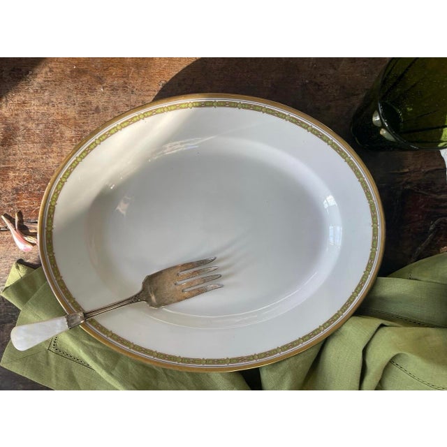 Fabulous 100 year old French platter, made by T.V. Tressemanes & Vogt (T&V) in Limoges, France, featuring a green and gold...