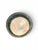 A glazed ceramic bowl by Gene Farkus, designed with a low footed base and wide flared form. The piece features a richly...