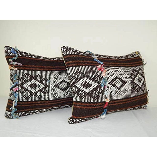 This handwoven kilim pillow is made from Anatolia and Middleast Kilim fragments. Each of our kilim pillow cover is cut...