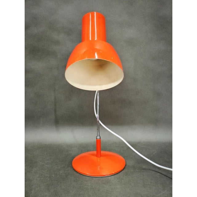 Vintage orange table lamp designed by josef hůrka for napako, czechoslovakia, circa 1960s. A characteristic example of...