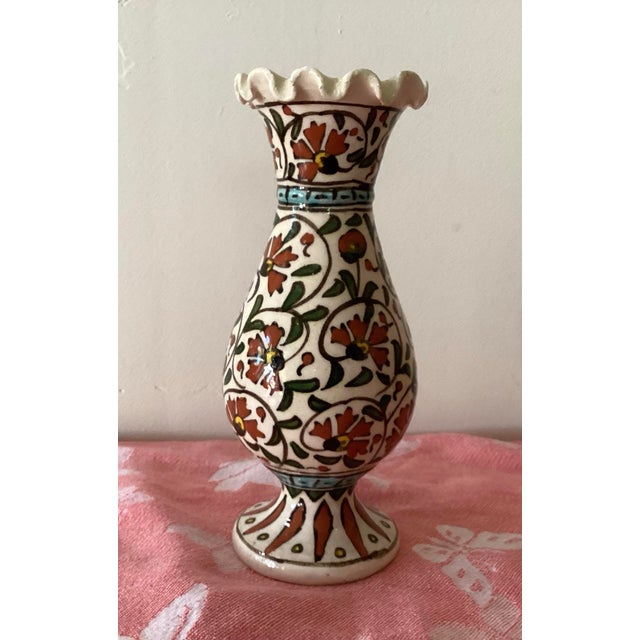 Turkish Kutahya hand painted vase with flared opening. Unmarked but having the distinctive shape and design of Kutahya....