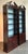 Make a grand architectural statement with this impressive pair of tall mahogany-finished library bookcases. These stately...