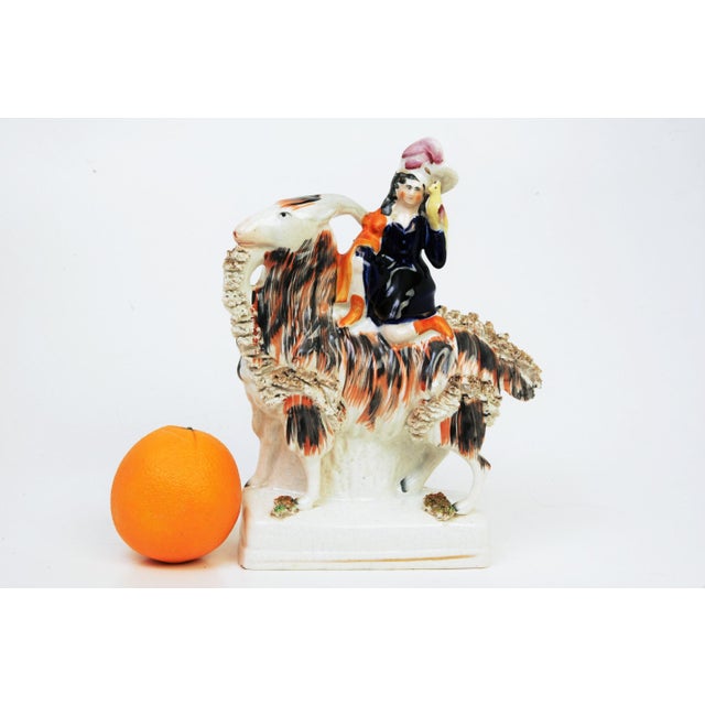 Outstanding Victorian-era Staffordshire figure depicting the Princess Royal upon a Tibetan goat, a gift from the Shah of...