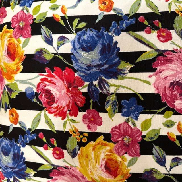 Decorative double sided pillow cover, handcrafted from a 100% cotton slub with a colorful floral printed pattern,...