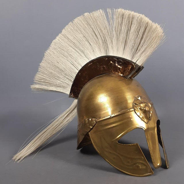 We offer for sale a fascinating vintage piece of furniture, an artistic reproduction of an ancient Greek Corinthian helmet...