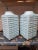 A magnificent pair of antique Chinese porcelain Cong-form vases, featuring a lustrous, smooth pale green celadon glaze....