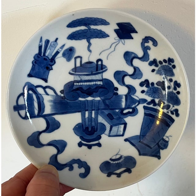 Antique 19th century Chinese blue and white porcelain dish or small plate. Decorated in the Kangxi manner with auspicious...