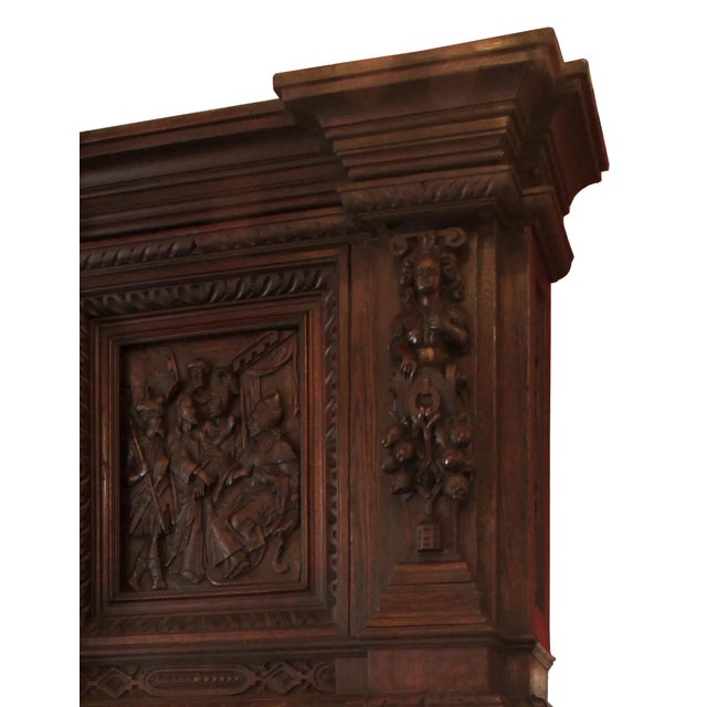 Monumental and important antique German Renaissance style chestnut mantel composed from earlier carved elements. Lower...