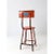 Vintage industrial stool with orange metal frame and round wooden seat. Features an arched backrest for subtle support....