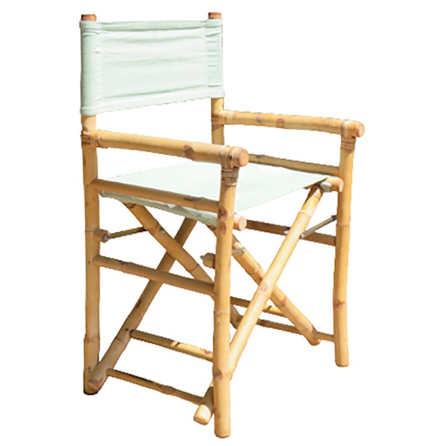 Fabulous vintage natural bamboo director's chair with sun-kissed mint green canvas back and seat. Equally at home in a...