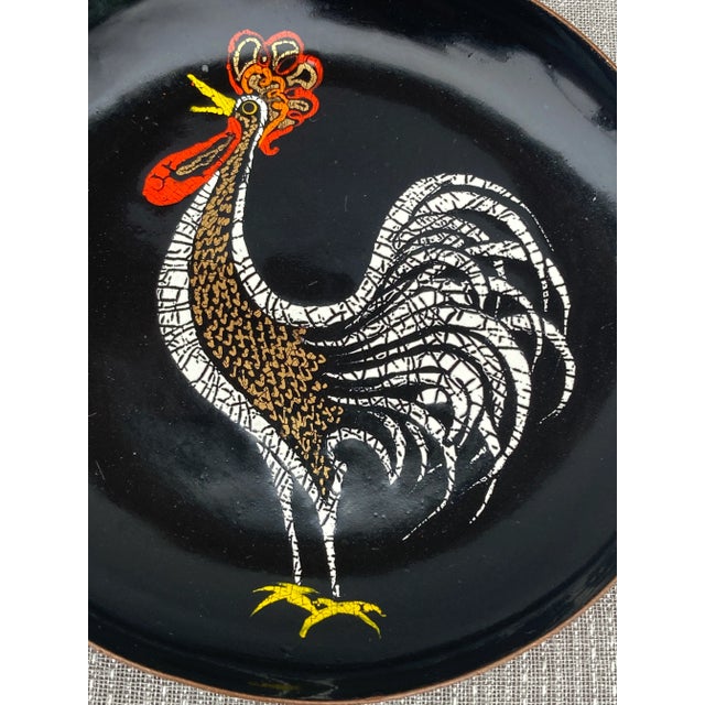 Vintage colorful enamel rooster dish, catchall with a solid copper back. Stamped Nekrassoff on the underside. It measures...