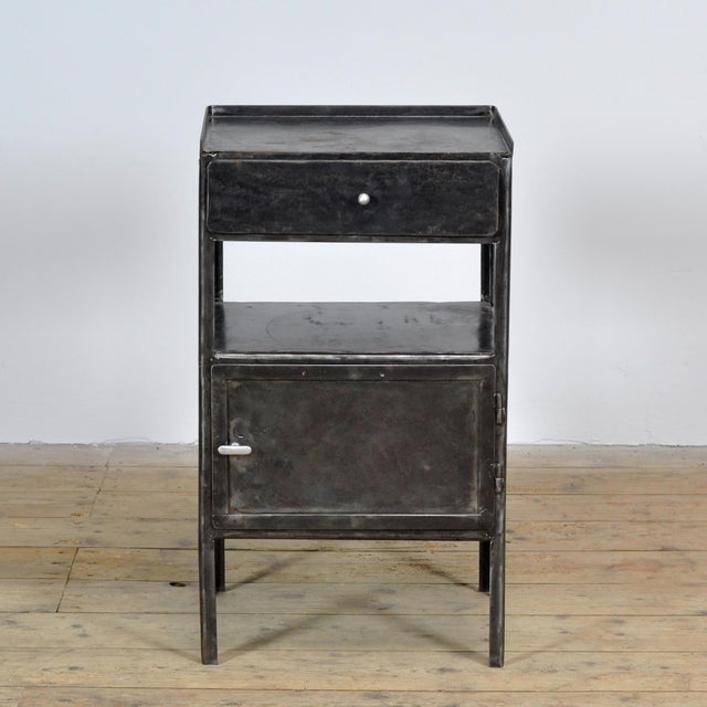 This iron bedside table exudes history and style. Originally from a hospital dating back to the 1910s, it has been...
