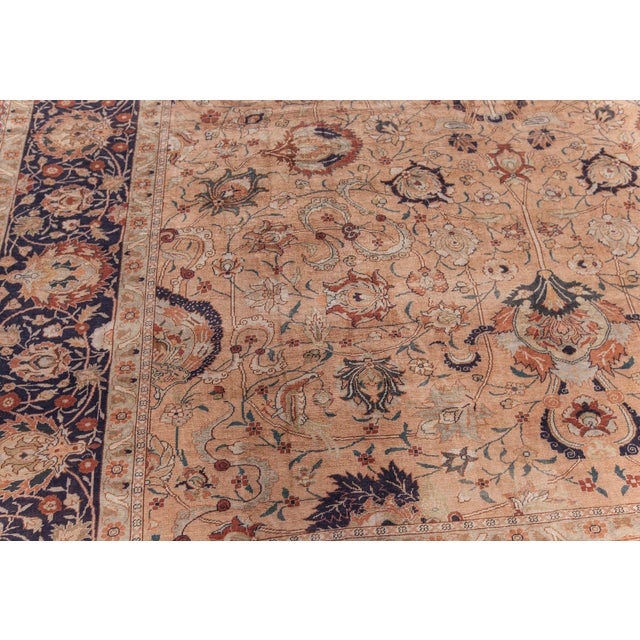A truly refined example of early 20th-century Turkish textile artistry, this antique silk rug captures the elegance and...