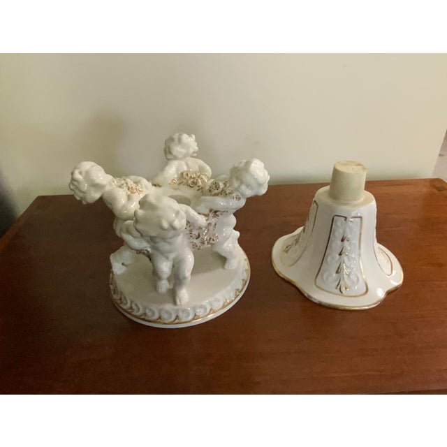 This porcelain centerpiece Vase by Karl Tutter Hutschenreuther is a unique addition to your antique collection. Well made,...