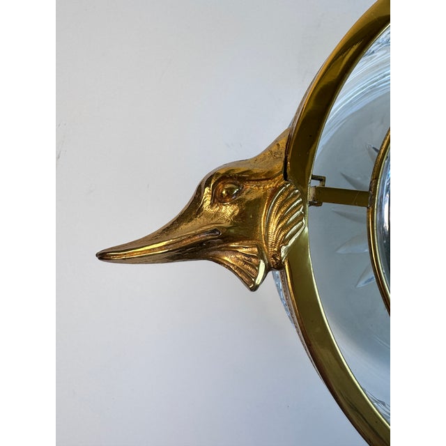 A wonderful serving piece for your sturgeon caviar. This French piece is made of crystal with brass detail. The fish...