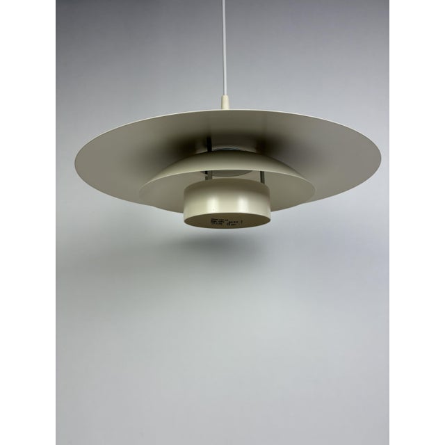 Danish White Pendant Lamp by Design Light, 1970s, in Very Good conditions. Designed 1970 to 1979 This piece has an...