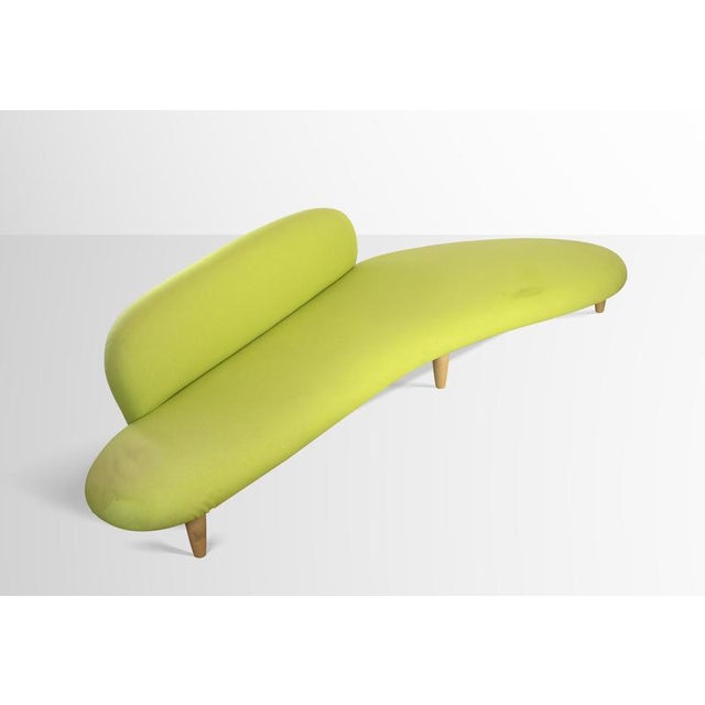 Freeform sofa is a design item realized by isamu noguchi produced by vitra. Wood and fabric sofa. Vitra original label and...