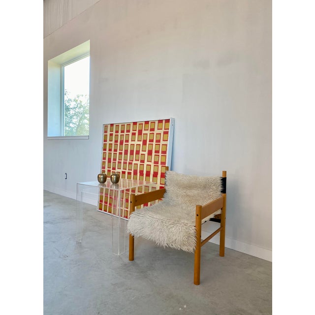 Minimalist beech armchair attributed to Otto Gerdau for Móveis Cimo (Brazil), featuring its original black cotton sling...