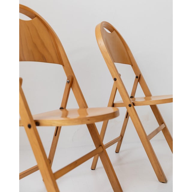 This vintage set of 2 TRIC folding chairs from the 1970s is an iconic design by Achille & Pier Giacomo Castiglioni for...