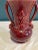 Bring timeless elegance into your home with this charming vintage finds piece from Shawnee Pottery. This gorgeous red vase...