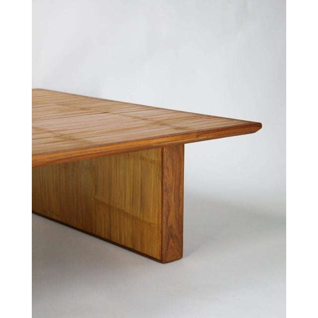 A japanese low table in bamboo, dating to the first half of the 20th century. the broad tabletop and low proportions give...