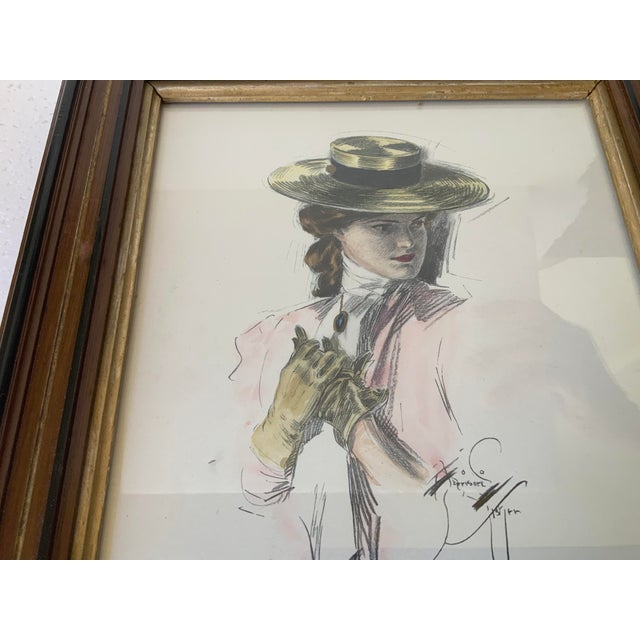 Signed “Harrison Fisher” in plate; probably from the 1907 book “A Dream of Fair Women”; image copyright 1907 by Charles...