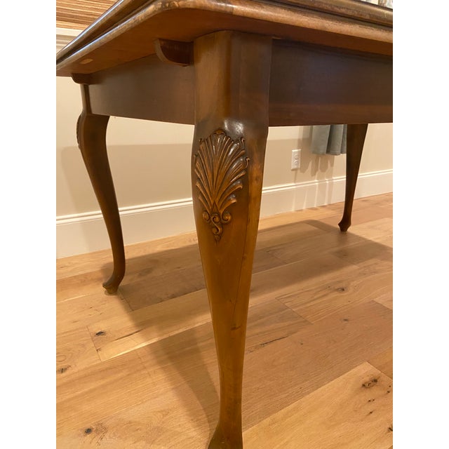 Overview An exceptional 19th Century, highly collectible refectory-style draw-leaf dining table Features solid-wood...