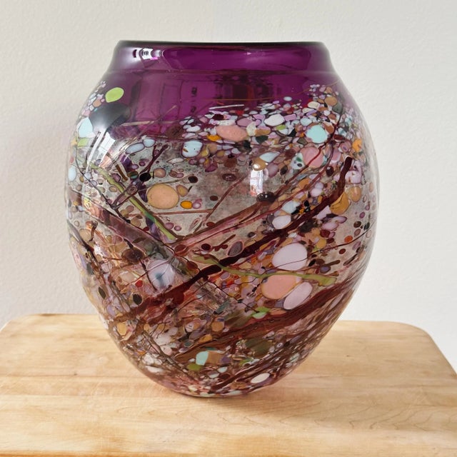 Vibrant Mouth Blown Art Glass Vase in Purple Signed by Artist John Gerletti Measures approx: 10H x 9D Please visit my...