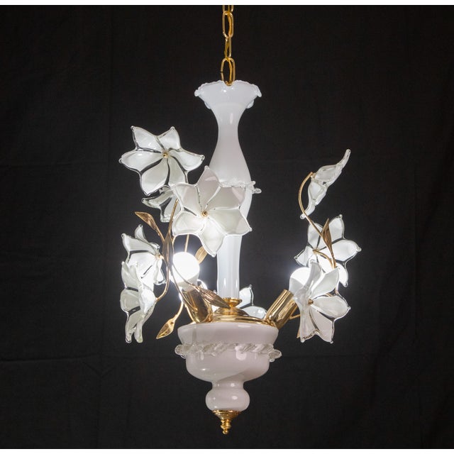 Vintage Murano glass chandelier with white flowers. Gold bath frame, excellent vintage condition The chandelier has 3...