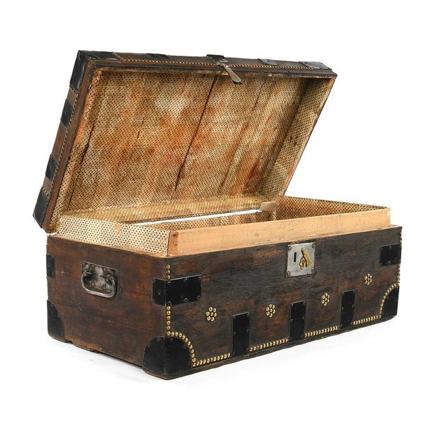 Trunk made of studded wood. Vintage wooden luggage. This piece is designed in the style of the selected designer and/or...