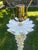 The vintage and iconic Serge Roche style palm tree floor lamp constructed of wood covered in white plaster. The palm tree...