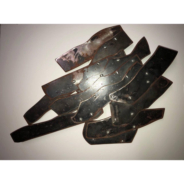 Robert Arthur Goodnough (AMERICAN, 1917-2010) Untitled patina on steel with nuts and bolts Robert Goodnough (October 23,...