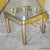 Vintage modern glass top living room end table. Tubular legs with flat bar supports with a rounded corner glass top. No...