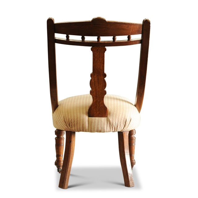 Victorian Striped Upholstery & Oak Open-Frame Library Chair with Carved Motifs & Ceramic Castors For Sale - Image 3 of 5