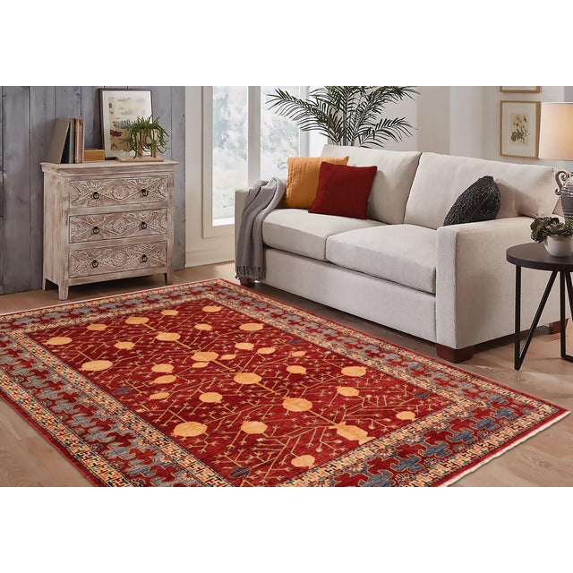 Enhance your home with this exquisite hand-knotted Super Kazak rug, crafted from fine hand-spun wool and dyed with all-...