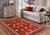 Enhance your home with this exquisite hand-knotted Super Kazak rug, crafted from fine hand-spun wool and dyed with all-...