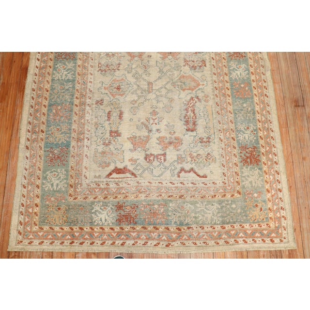 Late 19th Century Turkish Ghiordes Rug with an ivory field accents in green, apricot and rust