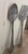 Galvanized metal spoon and fork wall decor has a rustic appearance. Each piece has decorative handles. Cast Aluminum with...
