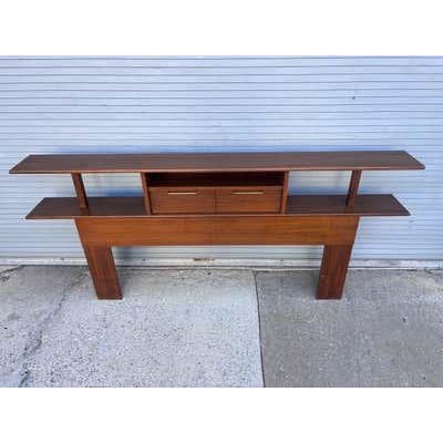 Cavalier furniture company very hard to find Queen Size Headboard with doors that swing down and shelf area probably would...