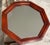 Distinctive vintage octagonal wall mirror by Tell City Chair Company, featuring a solid wood frame finished in the...