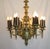 Outstanding authentic antique Bronze chandelier with 6 Torchiere arms, circa 19th. Each torchiere arm consists of 6...