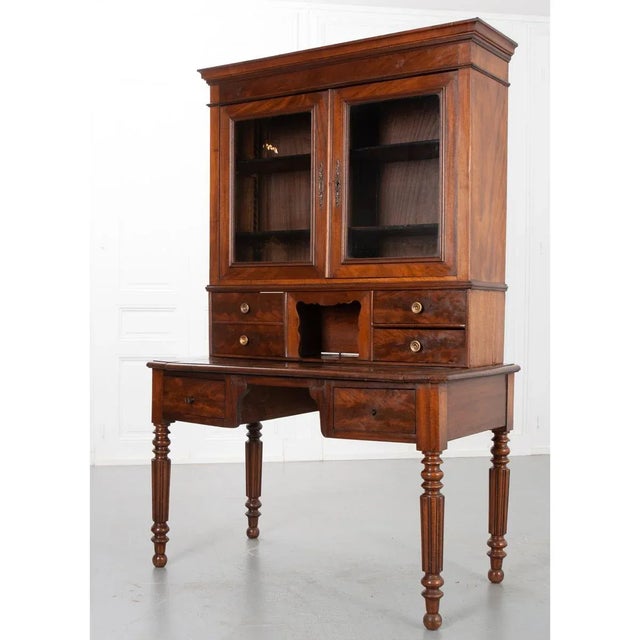 A wonderful walnut secretary desk from 19th century France, more transitional in style than distinctly Louis Philippe or...