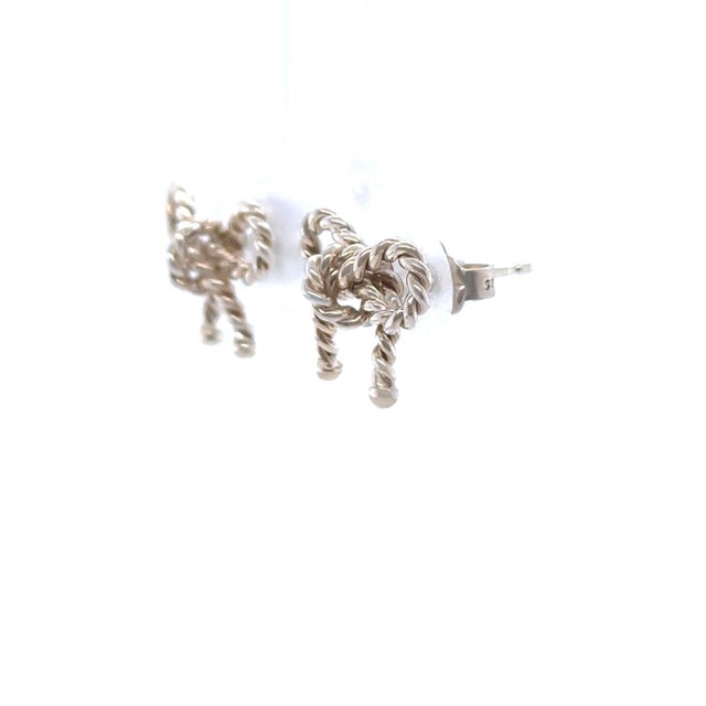 A rare vintage Tiffany & Co. pair of earrings crafted in sterling silver, featuring an elegant twist rope design formed...