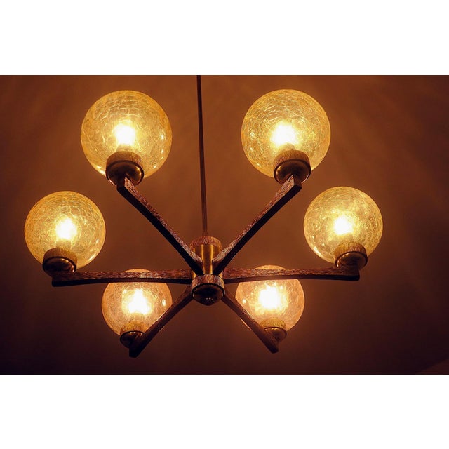 Dazzling gold-plated brass Italian chandelier with 6 crackle-glass globes on intricately designed arms, by Angelo Brotto...