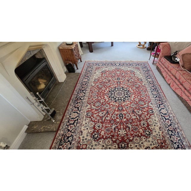 A superb multi coloured large rug with fringing, hand-knotted, probably Turkish, in excellent overall condition. 128" x 81"