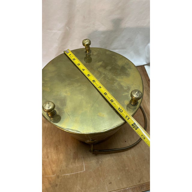 This item is an Antique Copper Brass Claw Footed Dovetailed Lidded Bucket Coal Scuttle, showcasing a style that exudes a...