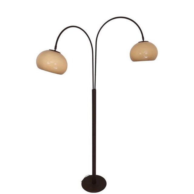 Rare model Dijkstra floor lamp. brown acrylic shades, brown base and brown arcs that can swivel independantly in any...